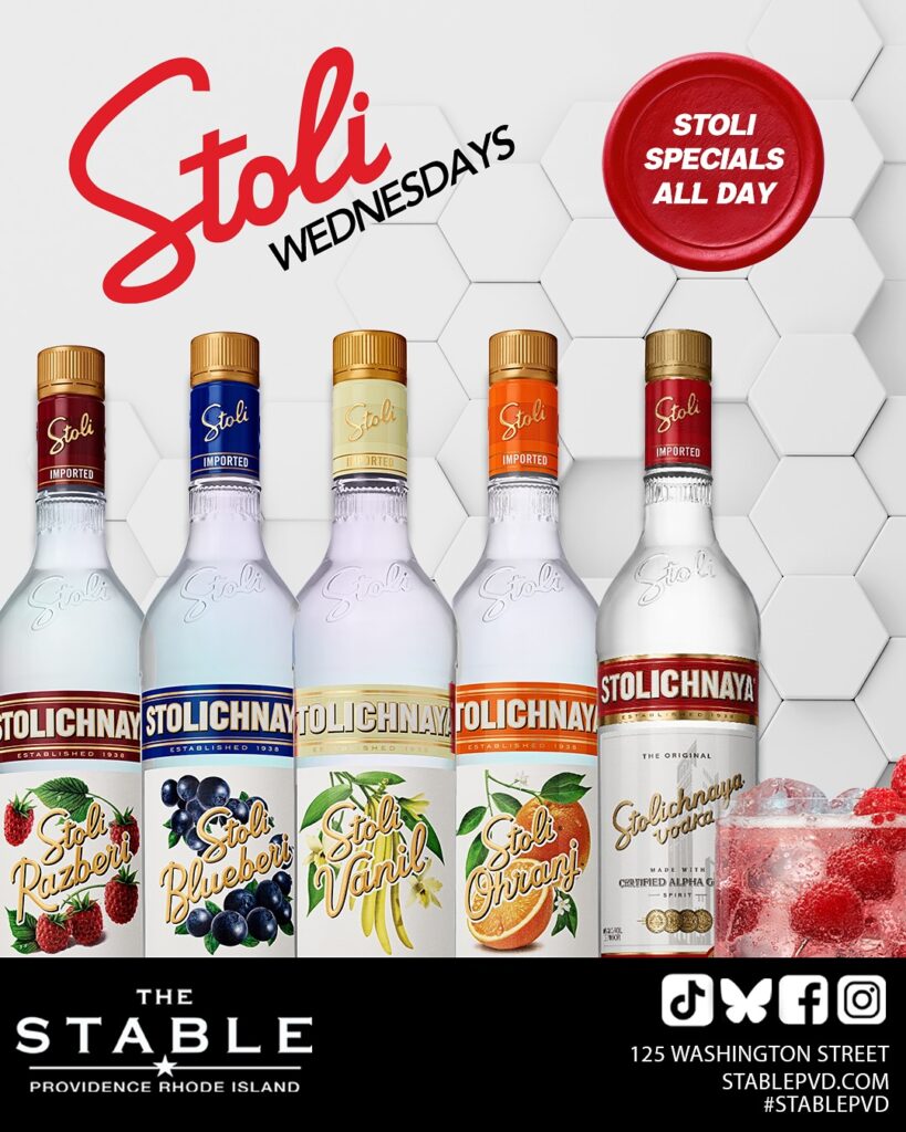 Five Stoli vodka bottles with flavors: Raspberry, Blueberry, Vanilla, Orange, and Original. Text promotes Stoli Wednesdays.